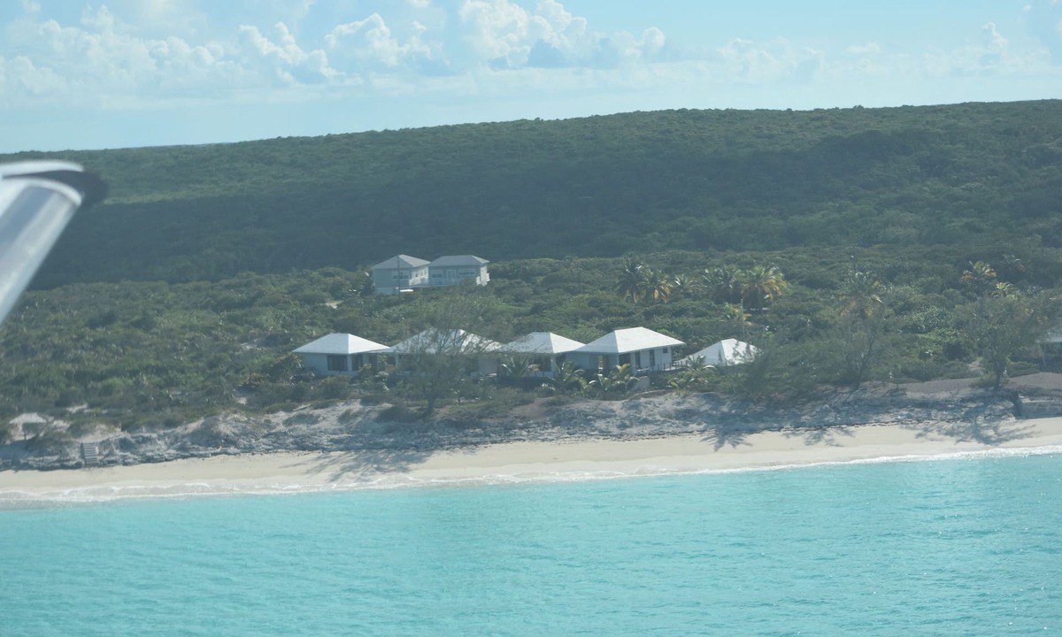 Great Exuma House | 4acres ON beach no drive 4 bedroom pool hot tub gym 3.5 baths 3+3outdoor showers