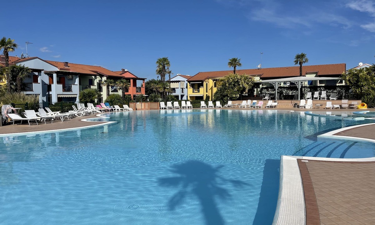 Aprilia Marittima Apartment | Charming apartment with private garden and swimming pool in Aprilia Marittima
