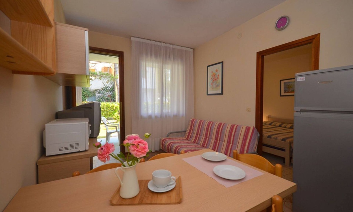 Bibione Apartment | Comfortable two room apartment with garden and swimming pool by Beahost Rentals
