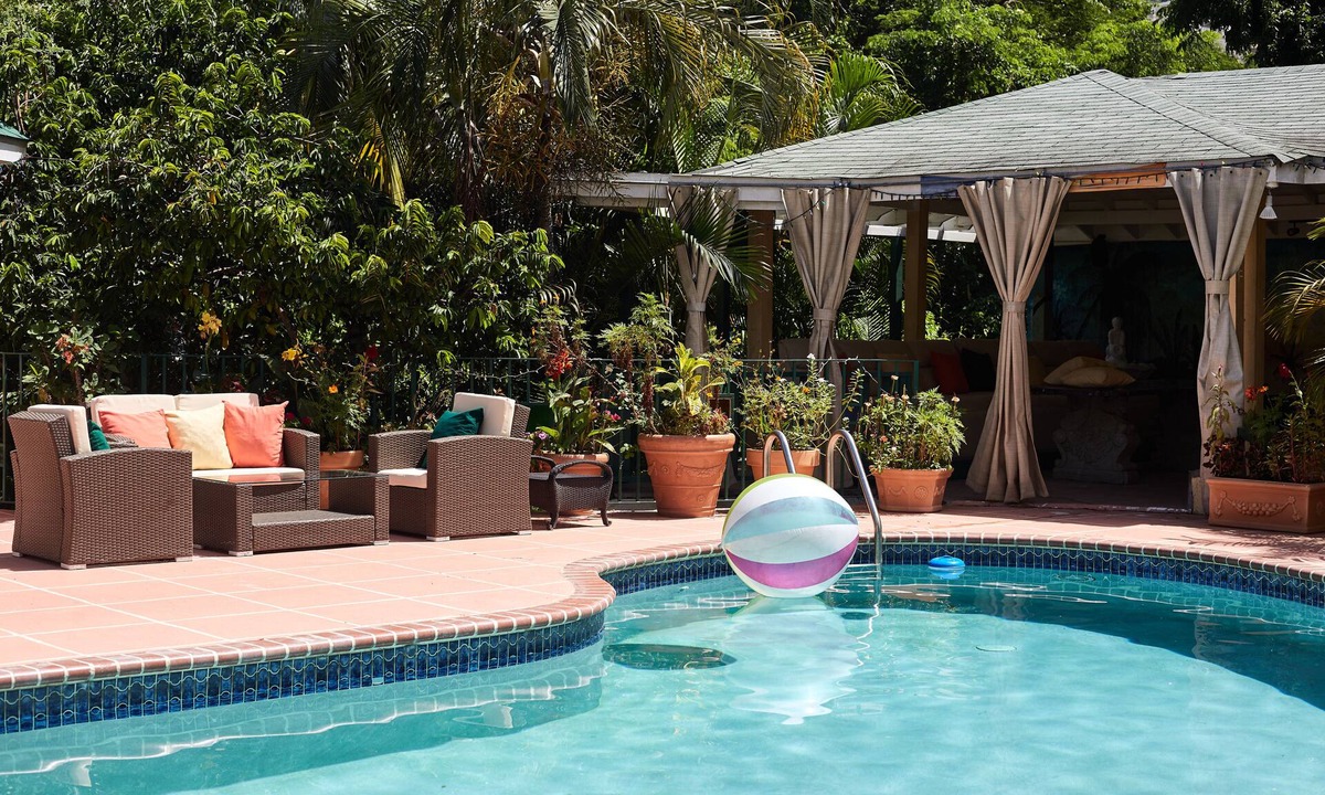 Jack's Hill House | Crowne Gardens. Safe, quiet, luxurious Kingston home with a scenic view.