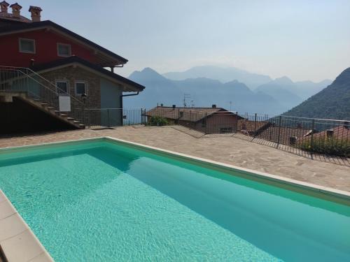Fonteno Apartment | HOST4U - BLONDIE Apartment with Pool & Beautiful View on Iseo Lake