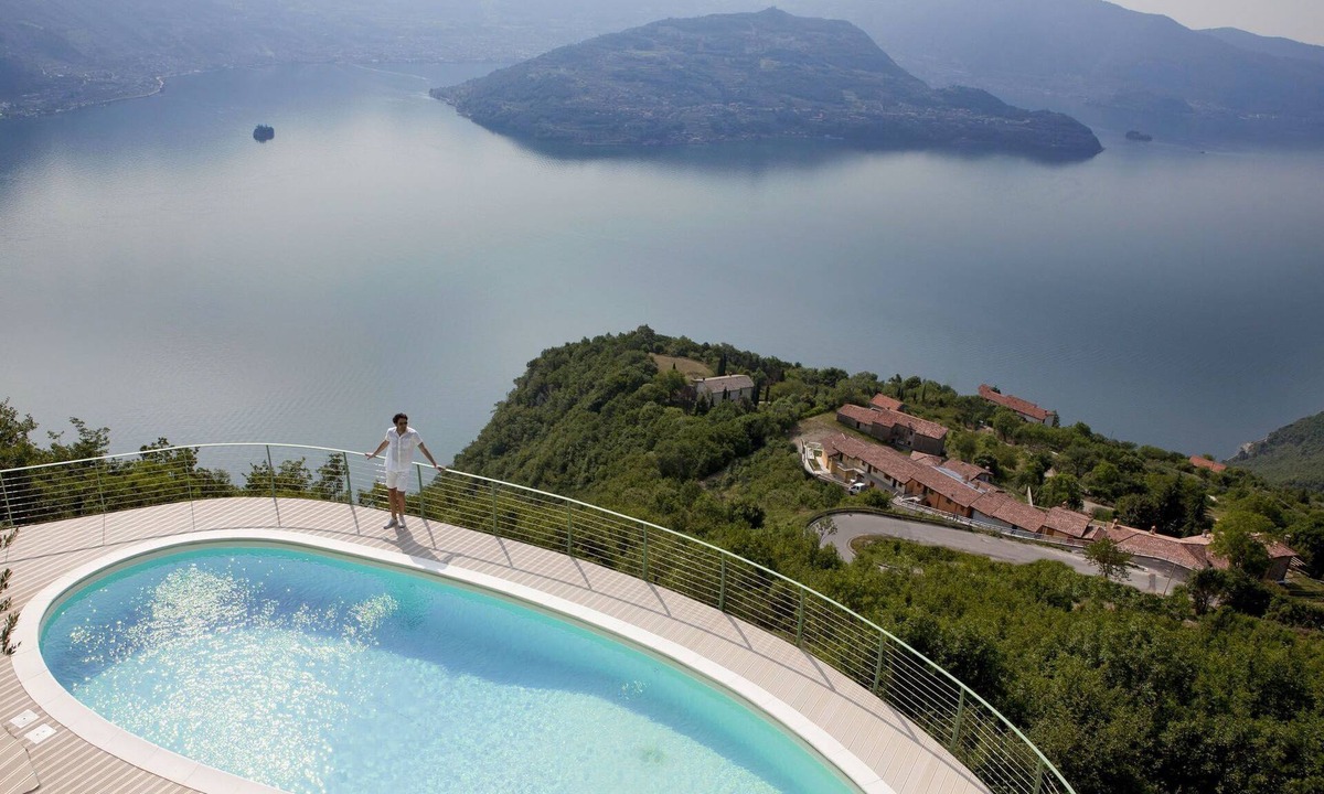 Plassi Apartment | Mantegna - garten mit seeblick und schwimmbad by Interhome