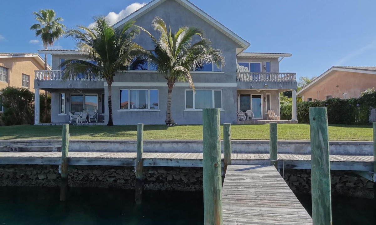 Bahamia West Condo | Spacious Gated Waterfront Villa with Private Dock