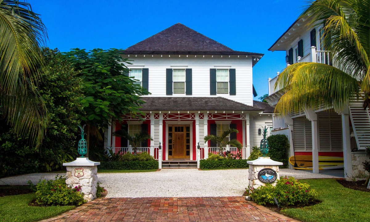 Old Fort Bay House | Stunning 6 bedroom on canal, pool, golf cart & optional Old Fort Bay Club access