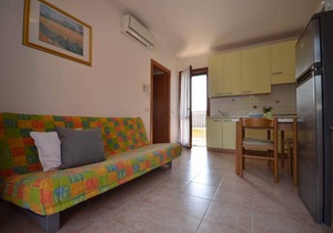 Holiday apartment with balcony and air conditioning