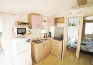 Mobilehome with air conditioning, terrace and pool