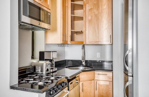 Peter Cooper Village Apartment | Airy Kips Bay 1BR w/Elevator & W/D, near MSQ Park & 6, by Blueground