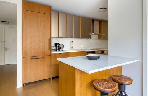 Sutton Place Apartment | Airy Midtown East 2BR w/Gym, Doorman & W/D, nr Parks, by Blueground