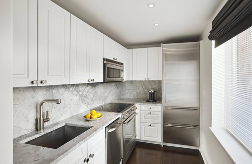 Sutton Place Hotel | AKA Residences Mahogany Floor Penthouse w/WiFi - Access to Gym & Pool