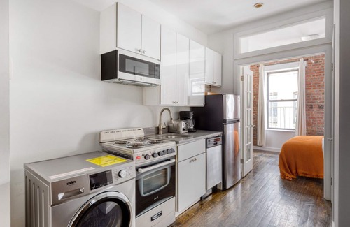 Bowery Apartment | Amazing LES 1BR w/W/D, near parks, by Blueground