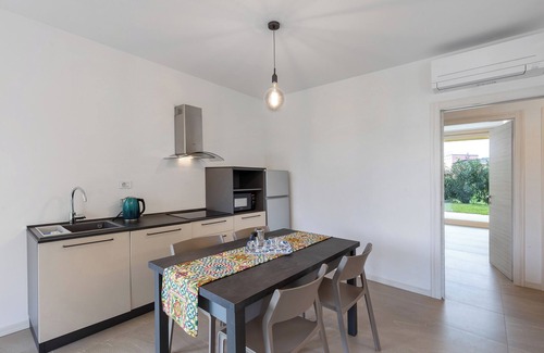 Montioni Apartment | Apartment 'Agriturismo Le Campagnole Green' with Shared Pool, Wi-Fi and Air Conditioning