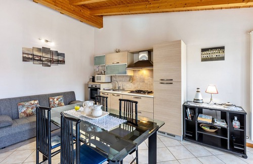 Ronchi Apartment | Apartment 'Residence La Corte' with Shared Pool, Balcony and Air Conditioning