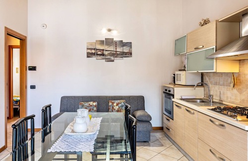 Ronchi Apartment | Apartment 'Residence La Corte' with Shared Pool, Balcony and Air Conditioning