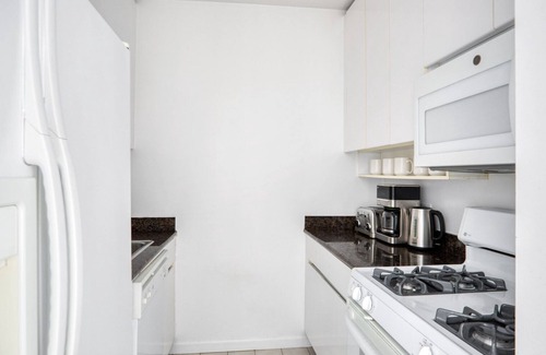 Sutton Place Apartment | Bright Sutton Place 2BR w/Pool, Gym, near Central Park, by Blueground