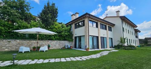 Caniezza House | Casa Ulivo - Il Brolo Holiday Homes