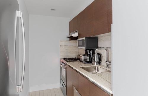 Midtown South Apartment | Hip Kips Bay Studio w/Gym & W/D, close to Park Ave, by Blueground