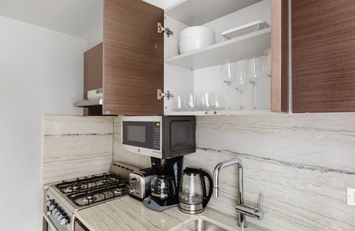 Midtown South Apartment | Hip Kips Bay Studio w/Gym & W/D, close to Park Ave, by Blueground