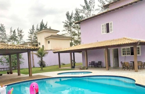 Tamoios House | House in front of the beach - Unamar / Cabo Frio
