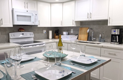 Williams Town Condo | Modern Beachfront Oasis in The Bahamas