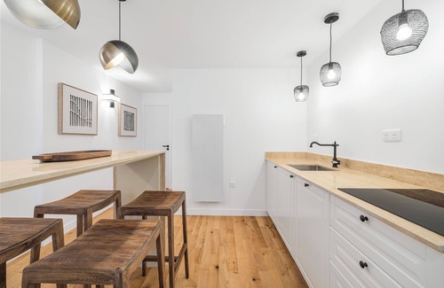 Quartier Sainte-Avoye Apartment | OVERLOOKING ARCHIVES MUSEUM WITH EXPANSIVE WINDOWS & CHIC INTERIORS - LE MARAIS