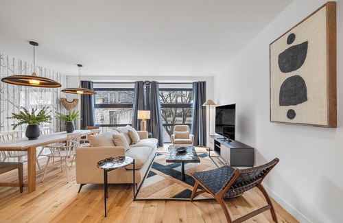 Quartier Sainte-Avoye Apartment | OVERLOOKING ARCHIVES MUSEUM WITH EXPANSIVE WINDOWS & CHIC INTERIORS - LE MARAIS
