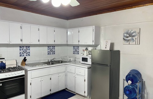 Nassau Apartment | Tangerine Sunsets Winton Rose