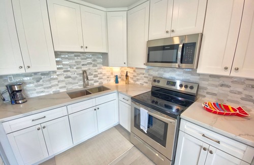 Treasure Cay Condo | 100% Renovated Ground floor condo w/Boat Slip - 3 min walk to beach!