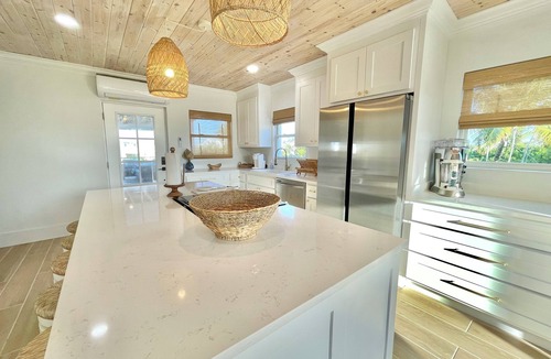 Treasure Cay House | 2 master suites w/2 separate living spaces w/pool & private beach access