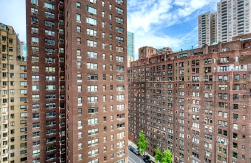 Sutton Place Apartment | Airy Midtown East 2BR w/Gym, Doorman & W/D, nr Parks, by Blueground