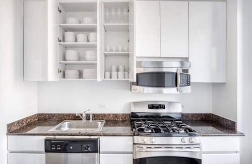 Sutton Place House | Airy Midtown East 3BR w/Elevator & Gym, nr Bloomingdales, by Blueground