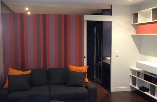 Quartier de Rochechouart Apartment | apartment courtyard with trees, in the heart of Paris