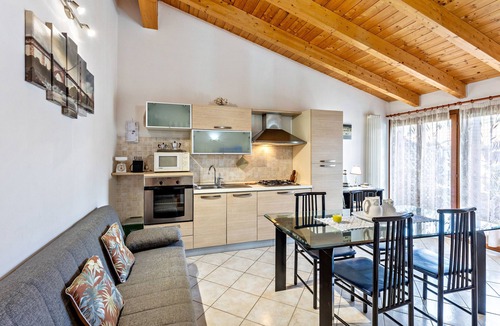Ronchi Apartment | Apartment 'Residence La Corte' with Shared Pool, Balcony and Air Conditioning