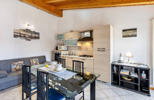 Ronchi Apartment | Apartment 'Residence La Corte' with Shared Pool, Balcony and Air Conditioning