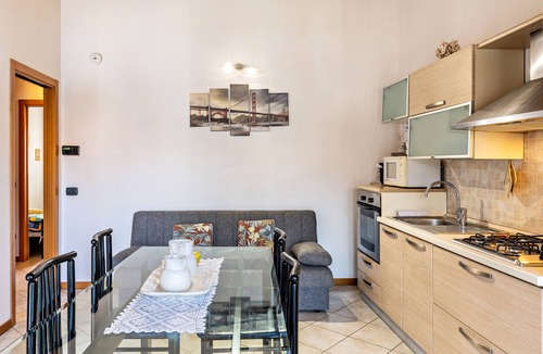 Ronchi Apartment | Apartment 'Residence La Corte' with Shared Pool, Balcony and Air Conditioning