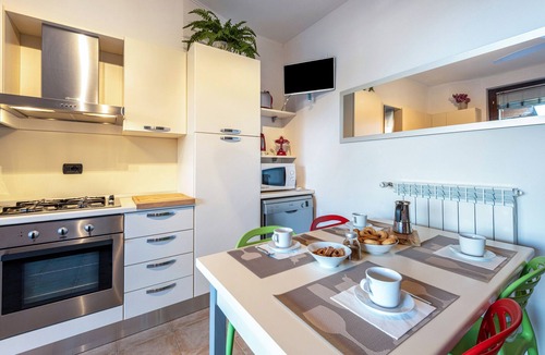 Cecina Apartment | "Appartamento 34" with Lake View, Shared Pool and Private Terrace