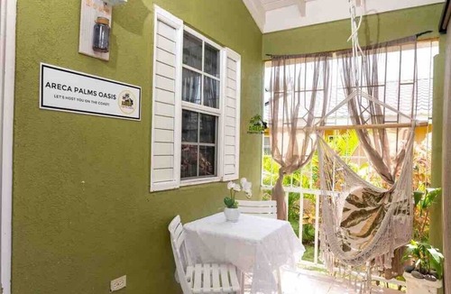 Mammee Bay House | Backyard Oasis in Drax Hall 70in TV