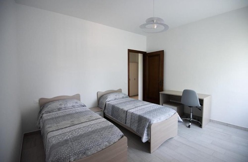 Crocetta-San Lazzaro-Modena Est Apartment | Barbieri Suite - Green, Relaxation and Comfort