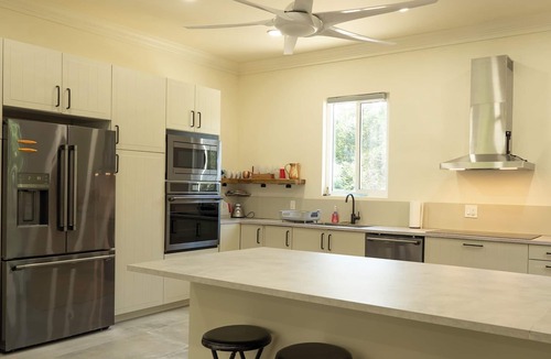Green Turtle Cay House | Beachfront Estate on Coco Bay , 2 apartments 1 house 7 bedrooms 7 bathrooms