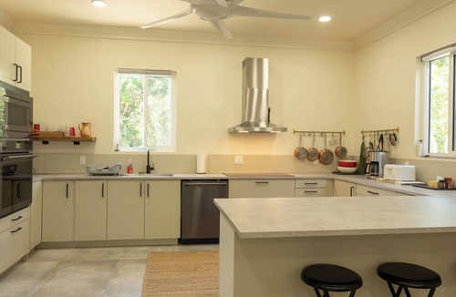 Green Turtle Cay House | Beachfront Estate on Coco Bay , 2 apartments 1 house 7 bedrooms 7 bathrooms