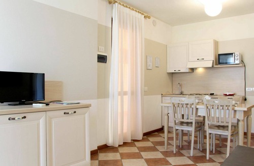 Castelnuovo del Garda Apartment | Beautiful apartment for 4 guests with pool, A/C, hot tub, WIFI, TV, terrace and pets allowed