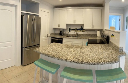 Treasure Cay Villa | Beautiful Beach Villa with a Screened in Porch 2BR - 2 BA - October Special!
