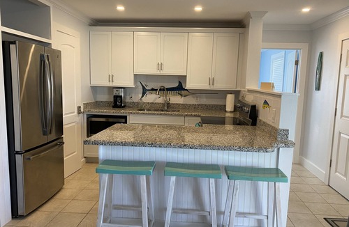 Treasure Cay Villa | Beautiful Beach Villa with a Screened in Porch 2BR - 2 BA - October Special!