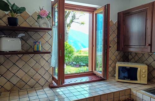 Albonico Apartment | Bel Pace vacation apartment with garden and mountain view