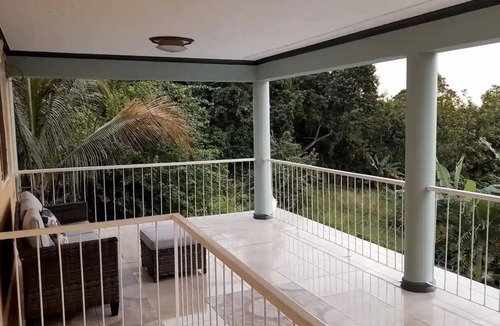 Saint Andrew House | Bougainvillea Palmsnn