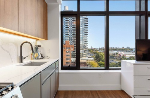 Bath Beach Apartment | Brooklyn Serenity: Luxe Comfort with Top Amenities