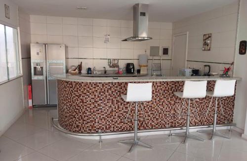 Sahy House | Casa em condomínio com Praia Reservada