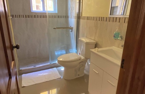 Runaway Bay Apartment | Central located apartment. Beach, pool and parking access. Pet friendly