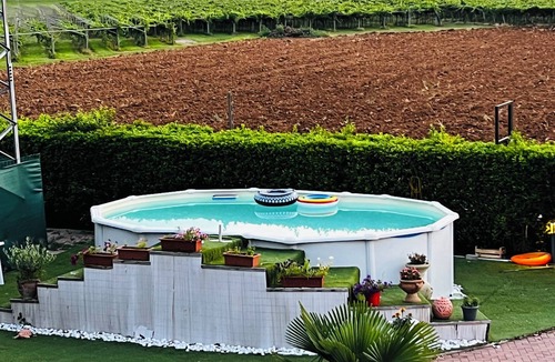 Costermano Villa | Charming 4-bedroom estate in enchanting Albaré Stazione with AC, WiFi