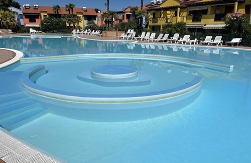 Aprilia Marittima Apartment | Charming apartment with private garden and swimming pool in Aprilia Marittima