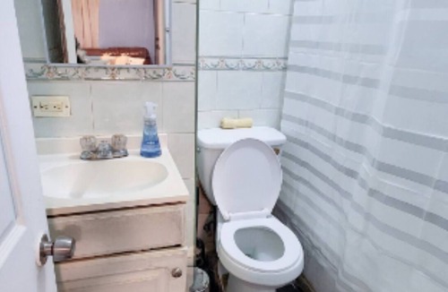 Queens Apartment | Charming Oasis Steps from Beach & Metro Station